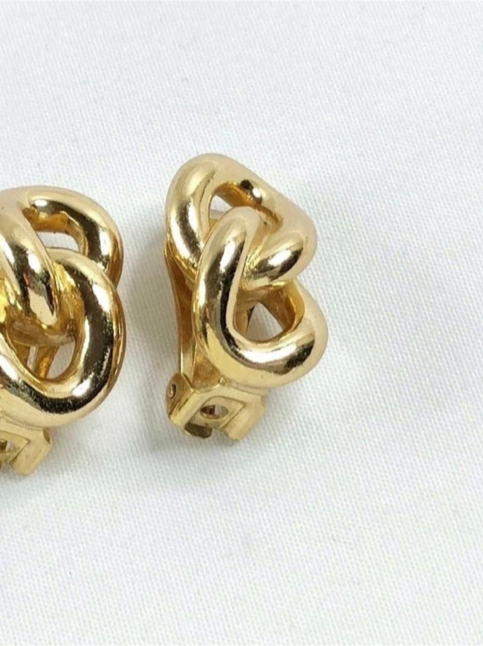 Christian Dior Gold-Tone Clip-On Knot Earrings Very good used condition.